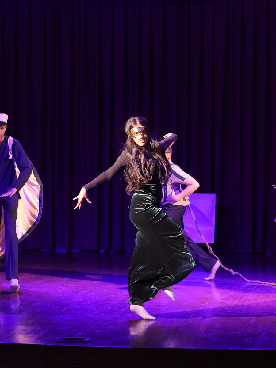 A pupil performing on stage