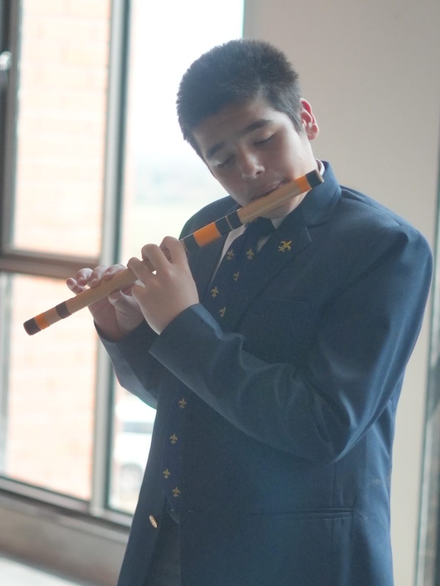 A pupil practising the flute